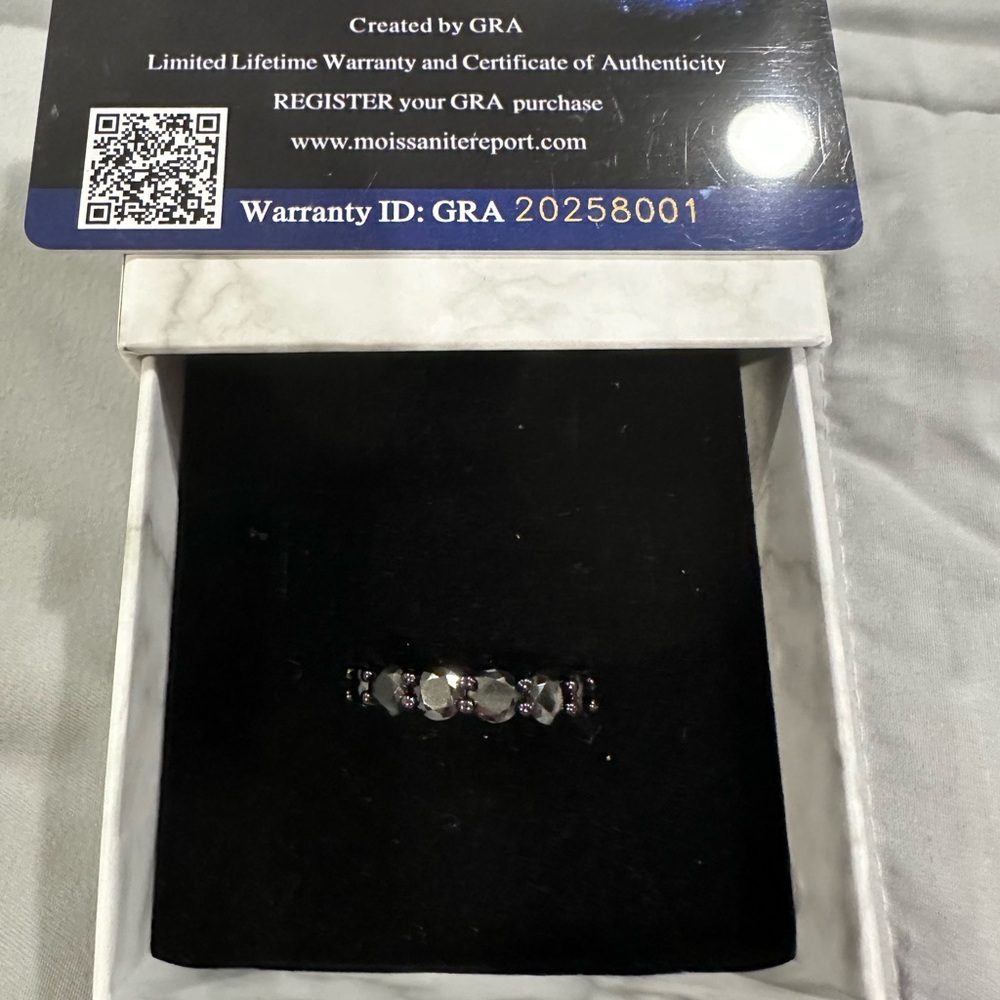 7 ct Black moissanite eternity band. Size 8. Comes with GRA